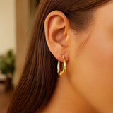 Medium Heart Hoop Earrings in 14K Yellow Gold