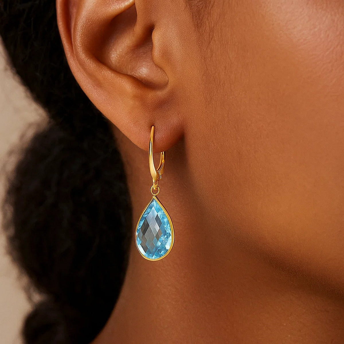 Drop Earrings with Pear-Shaped Blue Topaz Briolettes in 14k Yellow Gold