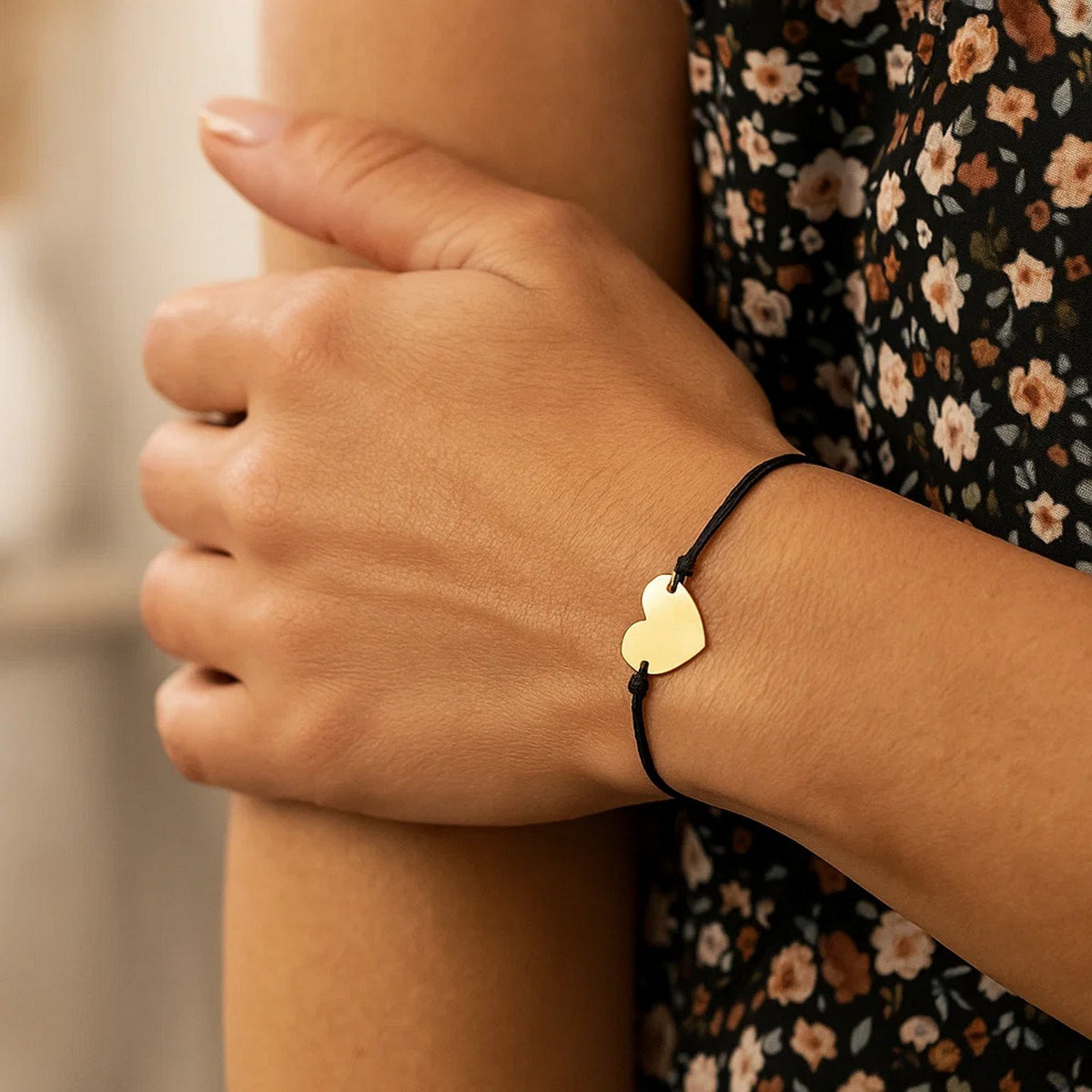 9 1/4 inch Black Cord Adjustable Bracelet with 14k yellow Gold Heart